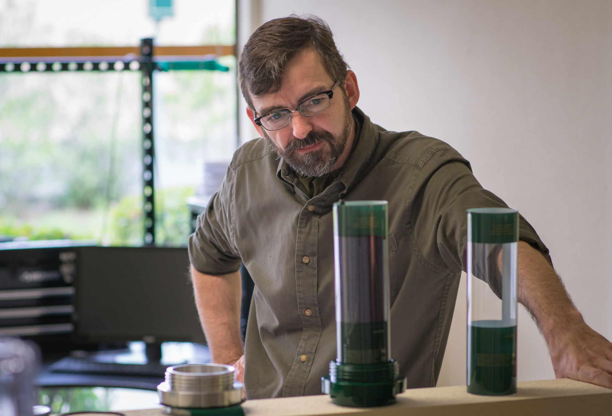 Jacob Christfort examining Ranch Systems hardware